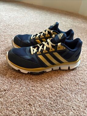 adidas Women’s Navy Blue and Gold Sneakers